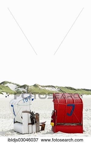 "Beach chairs on the beach in front of dunes, Norddorf, Amrum, Amrum, North Frisian Islands, Schleswig-Holstein, Germany, Europe" View Large Photo Image Stock Photo - "Beach chairs on the beach in front of dunes, Norddorf, Amrum, Amrum, North Frisian Islands, Schleswig-Holstein, Germany, Europe". Fotosearch