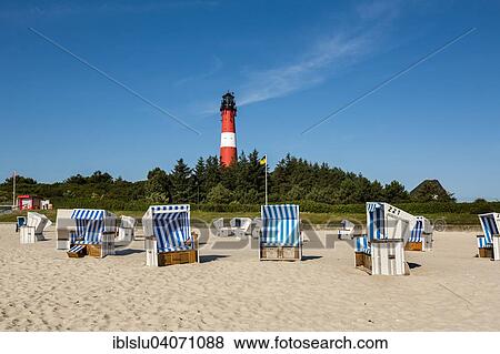 "Beach chairs on the beach in front of the lighthouse, Hornum, Sylt, North Frisia, Schleswig-Holstein, Germany, Europe" View Large Photo Image Stock Photo - "Beach chairs on the beach in front of the lighthouse, Hornum, Sylt, North Frisia, Schleswig-Holstein, Germany, Europe". Fotosearch