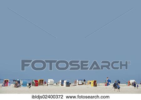 "Beach chairs on the beach of Norddorf, Amrum island, North Frisian Islands, Schleswig-Holstein, Germany, Europe" View Large Photo Image Stock Image - "Beach chairs on the beach of Norddorf, Amrum island, North Frisian Islands, Schleswig-Holstein, Germany, Europe". Fotosearch