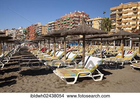 "Beach chairs on the sandy beach, apartment towers and hotels at the back, Fuengirola, Costa del Sol, Andalusia, Spain, Europe, PublicGround, Europe" View Large Photo Image Picture - "Beach chairs on the sandy beach, apartment towers and hotels at the back, Fuengirola, Costa del Sol, Andalusia, Spain, Europe, PublicGround, Europe". Fotosearch