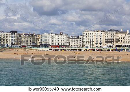 "Beach, houses on the waterfront at back, Brighton, East Sussex, England, United Kingdom, Europe" View Large Photo Image Stock Image - "Beach, houses on the waterfront at back, Brighton, East Sussex, England, United Kingdom, Europe". Fotosearch
