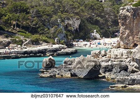 "Beach in a rocky bay, Cala Lombards, Mallorca, Majorca, Balearic Islands, Spain, Europe" View Large Photo Image Stock Photo - "Beach in a rocky bay, Cala Lombards, Mallorca, Majorca, Balearic Islands, Spain, Europe". Fotosearch