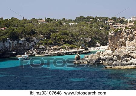 "Beach in a rocky bay, Cala Lombards, Mallorca, Majorca, Balearic Islands, Spain, Europe" View Large Photo Image Stock Photo - "Beach in a rocky bay, Cala Lombards, Mallorca, Majorca, Balearic Islands, Spain, Europe". Fotosearch