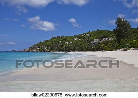 Stock Photo - "Beach of Anse Intendance and the Banyan Tree Hotel, Mahe Island, Seychelles, Africa, Indian Ocean, Africa". Fotosearch