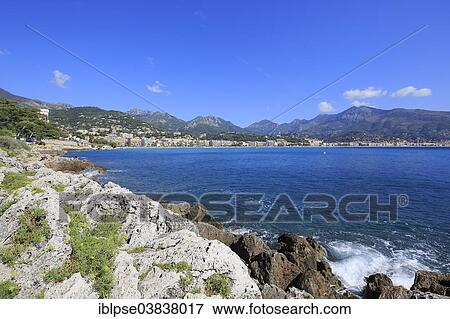 "Beach of Carnoles, looking towards Menton and the ridge of the border to Italy, Roquebrune Cap Martin, Maritime Alps, Provence Alpes Cote d'Azur, France, Europe" View Large Photo Image Stock Photo - "Beach of Carnoles, looking towards Menton and the ridge of the border to Italy, Roquebrune Cap Martin, Maritime Alps, Provence Alpes Cote d'Azur, France, Europe". Fotosearch