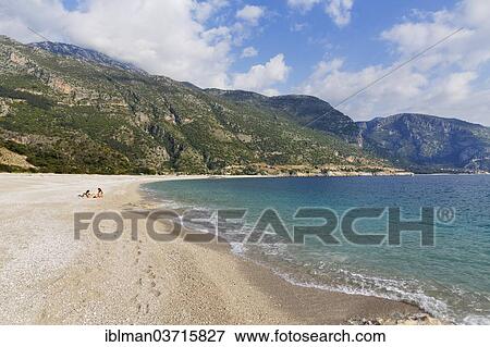Stock Photo - "Beach of Oludeniz with Mt Baba Dagi, Lycian coast, Oludeniz, Mugla Province, Aegean region, Turkey, Asia". Fotosearch