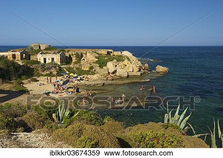"Beach of Punta della Mola, Penisola della Maddalena peninsula, Syracuse, Province of Syracuse, Sicily, Italy, Europe" View Large Photo Image Stock Photo - "Beach of Punta della Mola, Penisola della Maddalena peninsula, Syracuse, Province of Syracuse, Sicily, Italy, Europe". Fotosearch