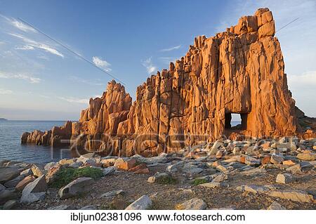 "Beach of Rocce Rosse, red porphyry rocks of Arbatax, Tortoli, Ogliastra province, Sardinia, Italy, Europe" View Large Photo Image Stock Photograph - "Beach of Rocce Rosse, red porphyry rocks of Arbatax, Tortoli, Ogliastra province, Sardinia, Italy, Europe". Fotosearch