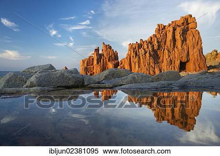 "Beach of Rocce Rosse, red porphyry rocks of Arbatax, Tortoli, Ogliastra province, Sardinia, Italy, Europe" View Large Photo Image Stock Photography - "Beach of Rocce Rosse, red porphyry rocks of Arbatax, Tortoli, Ogliastra province, Sardinia, Italy, Europe". Fotosearch