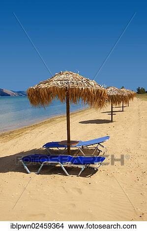 "Beach, parasols and sunbeds on Agrostoli Bay near Lixouri, Kefalonia, Ionian Islands, Greece, Europe" View Large Photo Image Picture - "Beach, parasols and sunbeds on Agrostoli Bay near Lixouri, Kefalonia, Ionian Islands, Greece, Europe". Fotosearch