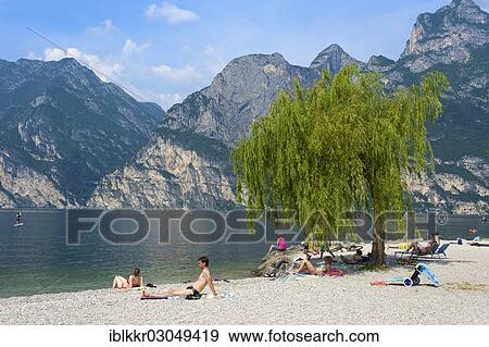 "Beach promenade at Lake Garda, Torbole, Lago di Garda, Italy, Europe" View Large Photo Image Stock Photo - "Beach promenade at Lake Garda, Torbole, Lago di Garda, Italy, Europe". Fotosearch