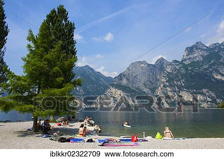 Stock Photo - "Beach promenade in Torbole on Lake Garda, Italy, Europe". Fotosearch