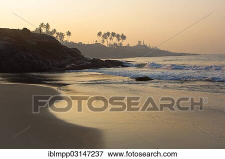 Stock Photo - "Beach, sunrise, Kovalam, Kerala, India, Asia". Fotosearch