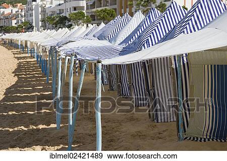 Beach tents, Sao Martinho do Porto, Alcobaca, Oeste, Leiria District, Portugal, Europe View Large Photo Image Stock Photo - Beach tents, Sao Martinho do Porto, Alcobaca, Oeste, Leiria District, Portugal, Europe. Fotosearch