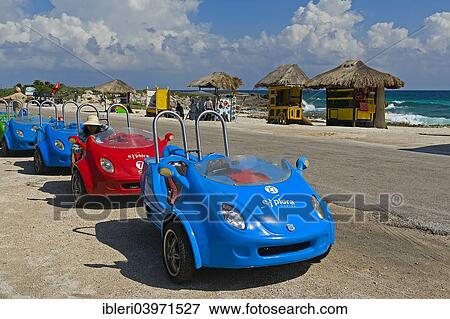 "Beach vehicles on the beach, Cozumel Island, Quintana Roo, Mexico, North America" View Large Photo Image Stock Photo - "Beach vehicles on the beach, Cozumel Island, Quintana Roo, Mexico, North America". Fotosearch