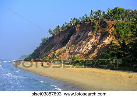 Stock Image - "Beach with red cliffs, South Cliff, Arabian Sea, Varkala, Kerala, South India, India, Asia". Fotosearch