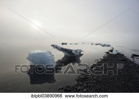 "Beached icebergs and fog at Pakenham Point, Prince William Sound, Alaska" View Large Photo Image Stock Photograph - "Beached icebergs and fog at Pakenham Point, Prince William Sound, Alaska". Fotosearch