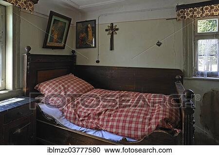 "Bed in the lower bedroom, furnished as in 1920, in a farmhouse originally from Kleinrinderfeld, built in 1779, relocated to the Franconian Open Air Museum in Bad Windsheim, Middle Franconia, Bavaria, Germany, Europe" View Large Photo Image Stock Image - "Bed in the lower bedroom, furnished as in 1920, in a farmhouse originally from Kleinrinderfeld, built in 1779, relocated to the Franconian Open Air Museum in Bad Windsheim, Middle Franconia, Bavaria, Germany, Europe". Fotosearch