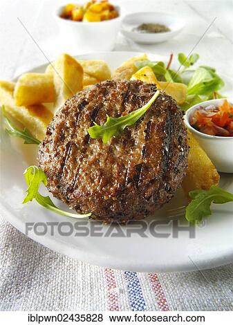 Beef patty grilled with French fries and salad View Large Photo Image Stock Photo - Beef patty grilled with French fries and salad. Fotosearch