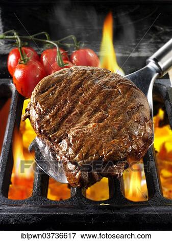 Beef steak on a BBQ View Large Photo Image Stock Photo - Beef steak on a BBQ. Fotosearch