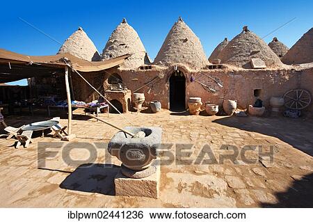 Stock Photograph - "Beehive adobe buildings of Harran, south west Anatolia, Turkey, Asia". Fotosearch