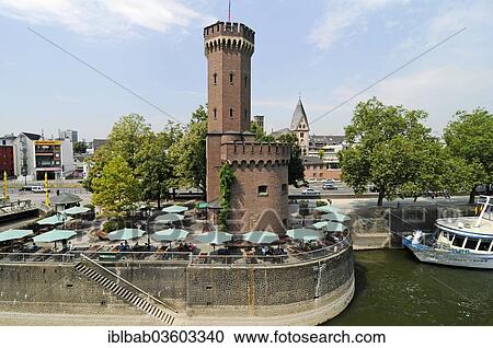 Stock Image - "Beer garden at the Malakoffturm, Malakoff Tower, Rheinauhafen, Cologne, Rhineland, North Rhine-Westphalia, Germany, Europe". Fotosearch