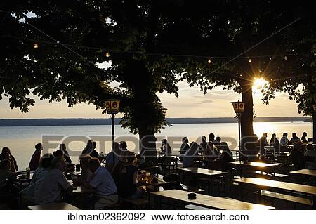 "Beer garden in Herrsching, Ammersee Lake, Fuenseenland region, Upper Bavaria, Bavaria, Germany, Europe, PublicGround, Europe" View Large Photo Image Stock Image - "Beer garden in Herrsching, Ammersee Lake, Fuenseenland region, Upper Bavaria, Bavaria, Germany, Europe, PublicGround, Europe". Fotosearch