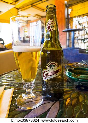 "Beer glass and a beer bottle, """"Casablanca"""", Moroccan beer, Cafe Arabe, trendy meeting place, Medina, Marrakech, Marrakech-Tensift-Al Haouz, Morocco, Africa" View Large Photo Image Picture - "Beer glass and a beer bottle, """"Casablanca"""", Moroccan beer, Cafe Arabe, trendy meeting place, Medina, Marrakech, Marrakech-Tensift-Al Haouz, Morocco, Africa". Fotosearch