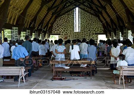 "Believers attending a mass in a stone church, Insel Kvato, Alotau, Papua New Guinea, Oceania" View Large Photo Image Stock Photo - "Believers attending a mass in a stone church, Insel Kvato, Alotau, Papua New Guinea, Oceania". Fotosearch