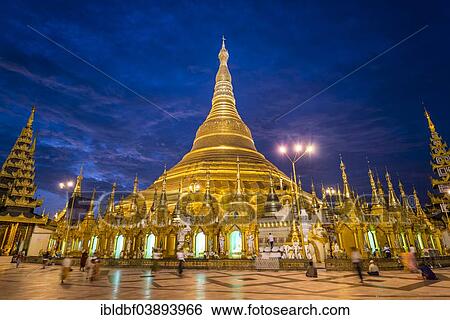 "Believers, golden main stupa, chedi, blue hour, Shwedagon Pagoda, Singuttara Hill, Yangon or Rangoon, Yangon Region, Myanmar, Asia" View Large Photo Image Stock Photograph - "Believers, golden main stupa, chedi, blue hour, Shwedagon Pagoda, Singuttara Hill, Yangon or Rangoon, Yangon Region, Myanmar, Asia". Fotosearch