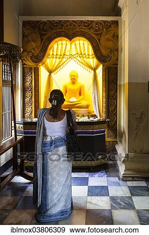 "Believers praying in the Temple of the Sacred Tooth Relic, Sri Dalada Maligawa, Buddhist temple, Kandy, Central Province, Sri Lanka, Asia" View Large Photo Image Stock Photo - "Believers praying in the Temple of the Sacred Tooth Relic, Sri Dalada Maligawa, Buddhist temple, Kandy, Central Province, Sri Lanka, Asia". Fotosearch