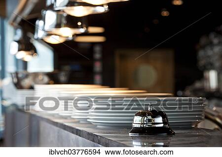 Bell on the food counter of a restaurant View Large Photo Image Picture - Bell on the food counter of a restaurant. Fotosearch