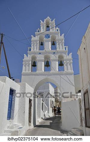 Picture - "Bell tower of the Agii Anargiri church at the entrance to the village of Megalochori, Santorini, Cyclades, Greek island, Greece, Europe". Fotosearch