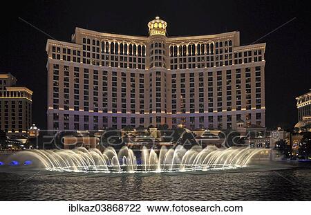 "Bellagio Hotel and Casino with dancing water fountain show at night, Las Vegas, Nevada, USA" View Large Photo Image Stock Image - "Bellagio Hotel and Casino with dancing water fountain show at night, Las Vegas, Nevada, USA". Fotosearch
