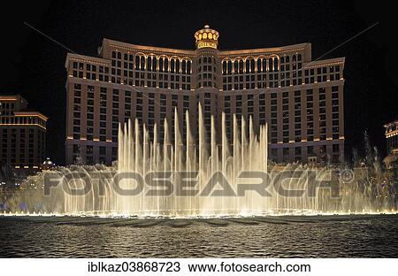 "Bellagio Hotel and Casino with dancing water fountain show at night, Las Vegas, Nevada, USA" View Large Photo Image Stock Image - "Bellagio Hotel and Casino with dancing water fountain show at night, Las Vegas, Nevada, USA". Fotosearch