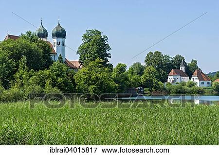 "Benedictine monastery Seeon monastery with church of St. Lambert and Walburgiskapelle chapel, Klostersee, Seebruck, Chiemgau, Upper Bavaria, Bavaria, Germany, Europe" View Large Photo Image Stock Photo - "Benedictine monastery Seeon monastery with church of St. Lambert and Walburgiskapelle chapel, Klostersee, Seebruck, Chiemgau, Upper Bavaria, Bavaria, Germany, Europe". Fotosearch