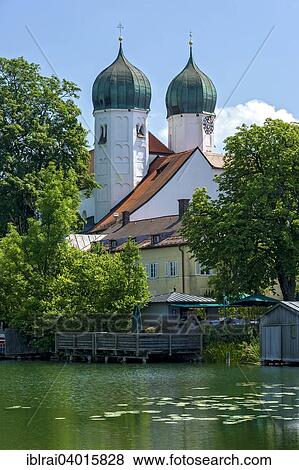 "Benedictine monastery Seeon with monastery church of St. Lambert, Klostersee, Seebruck, Chiemgau, Upper Bavaria, Bavaria, Germany, Europe" View Large Photo Image Stock Photo - "Benedictine monastery Seeon with monastery church of St. Lambert, Klostersee, Seebruck, Chiemgau, Upper Bavaria, Bavaria, Germany, Europe". Fotosearch