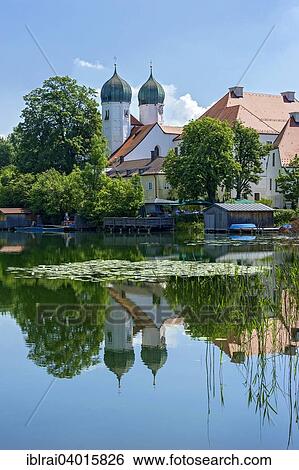 "Benedictine monastery Seeon with monastery church of St. Lambert, Klostersee, Seebruck, Chiemgau, Upper Bavaria, Bavaria, Germany, Europe" View Large Photo Image Stock Photograph - "Benedictine monastery Seeon with monastery church of St. Lambert, Klostersee, Seebruck, Chiemgau, Upper Bavaria, Bavaria, Germany, Europe". Fotosearch