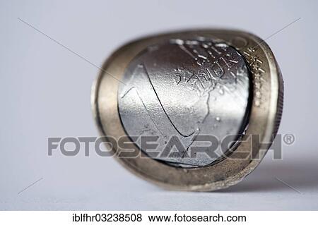 Stock Photo - "Bent euro coin, Germany, Europe". Fotosearch