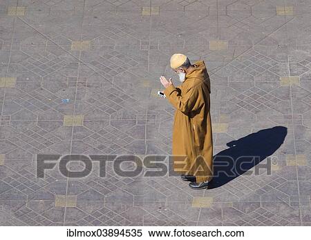 "Berber man, Muslim man with a mobile phone, Djemaa el Fna square, historic Medina, Marrakech, Marrakech-Tensift-El Haouz, Morocco, Africa" View Large Photo Image Stock Photography - "Berber man, Muslim man with a mobile phone, Djemaa el Fna square, historic Medina, Marrakech, Marrakech-Tensift-El Haouz, Morocco, Africa". Fotosearch