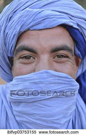 "Berber with light blue turban, Merzouga, Meknes-Tafilalet region, Morocco, Africa" View Large Photo Image Stock Photography - "Berber with light blue turban, Merzouga, Meknes-Tafilalet region, Morocco, Africa". Fotosearch