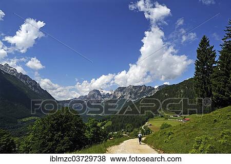 "Berchtesgaden Alps with a hiker walking along a hiking trail, Reiteralpe Mountain at the rear, Loiplsau, Ramsau bei Berchtesgaden, Berchtesgadener Land District, Upper Bavaria, Bavaria, Germany, Europe" View Large Photo Image Stock Photo - "Berchtesgaden Alps with a hiker walking along a hiking trail, Reiteralpe Mountain at the rear, Loiplsau, Ramsau bei Berchtesgaden, Berchtesgadener Land District, Upper Bavaria, Bavaria, Germany, Europe". Fotosearch