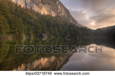 "Berglsteinersee lake at the first light of the morning, Kramsach, Kufstein District, North Tirol, Tirol, Austria, Europe" View Large Photo Image Stock Photo - "Berglsteinersee lake at the first light of the morning, Kramsach, Kufstein District, North Tirol, Tirol, Austria, Europe". Fotosearch