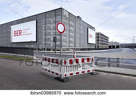 Stock Image - "Berlin Brandenburg Airport BER, under construction, multi-storey car park at the new terminal, Schonefeld, Brandenburg, Germany, Europe". Fotosearch