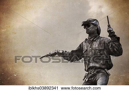 Stock Image - "Berlin street artist dressed as a cowboy, retro look, Berlin, Germany, Europe". Fotosearch