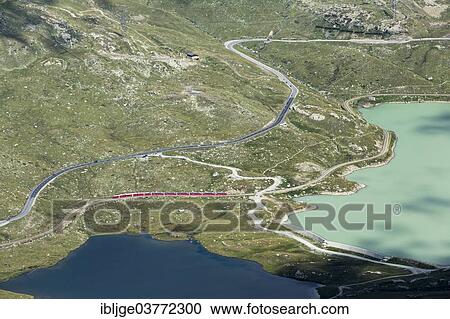 "Bernina Pass or Passo del Bernina, road and railway line, Canton of Grisons, Switzerland, Europe" View Large Photo Image Stock Image - "Bernina Pass or Passo del Bernina, road and railway line, Canton of Grisons, Switzerland, Europe". Fotosearch