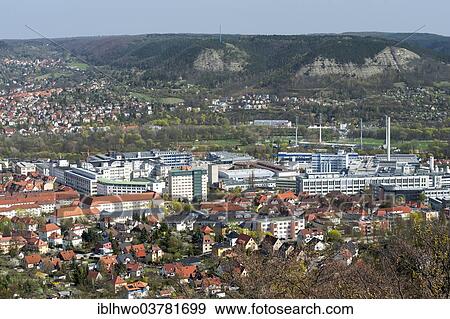 Stock Photo - "Beutenberg Campus, behind Paradise-Park, limestone hills in the Saale valley, Jena, Thuringia, Germany, Europe". Fotosearch