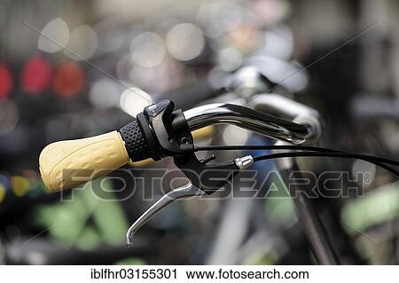 "Bicycle handlebars with yellow handles, Neuss, North Rhine-Westphalia, Germany, Europe" View Large Photo Image Stock Image - "Bicycle handlebars with yellow handles, Neuss, North Rhine-Westphalia, Germany, Europe". Fotosearch