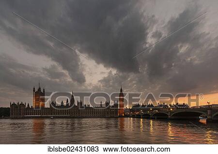 Stock Image - "Big Ben, Westminster Palace, Houses of Parliament at dusk, Unesco World Heritage Site, Westminster Bridge, London, England, United Kingdom, Europe". Fotosearch