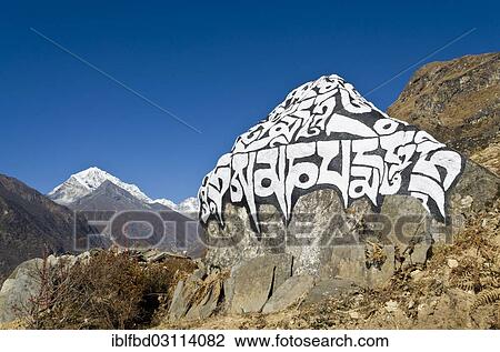 "Big Mani Stone in the valley above Namche Bazar (3. 440 m), the base for trekking and mountaineering in Solo Khumbu region, near Namche Bazar, Solukhumbu District, Sagarmatha Zone, Nepal, Asia" View Large Photo Image Stock Image - "Big Mani Stone in the valley above Namche Bazar (3. 440 m), the base for trekking and mountaineering in Solo Khumbu region, near Namche Bazar, Solukhumbu District, Sagarmatha Zone, Nepal, Asia". Fotosearch
